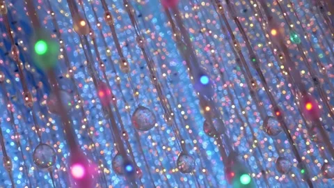 A room with mirror walls full of vertically hanging multicolor LED light stripes Stock Footage 333353160