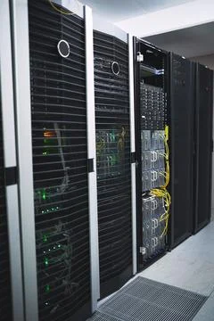 This room needs to be protected like fort knox. an empty server room. Stock Photos