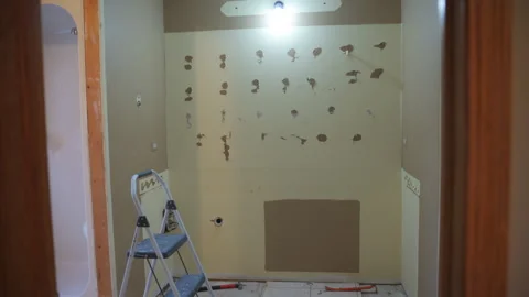 Room Renovation. Wall Demolition in Progress Vídeos de archivo 304438549