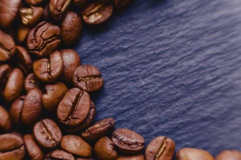 Roosted coffee beans texture with dark space for text Stock Photos