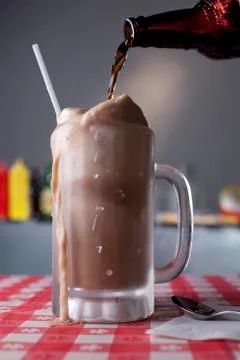 Root Beer Pouring into a Root Beer Float Stock Photos