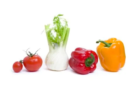 Root of parsley of red pepper with yellow pepper and tomatoes Foto stock
