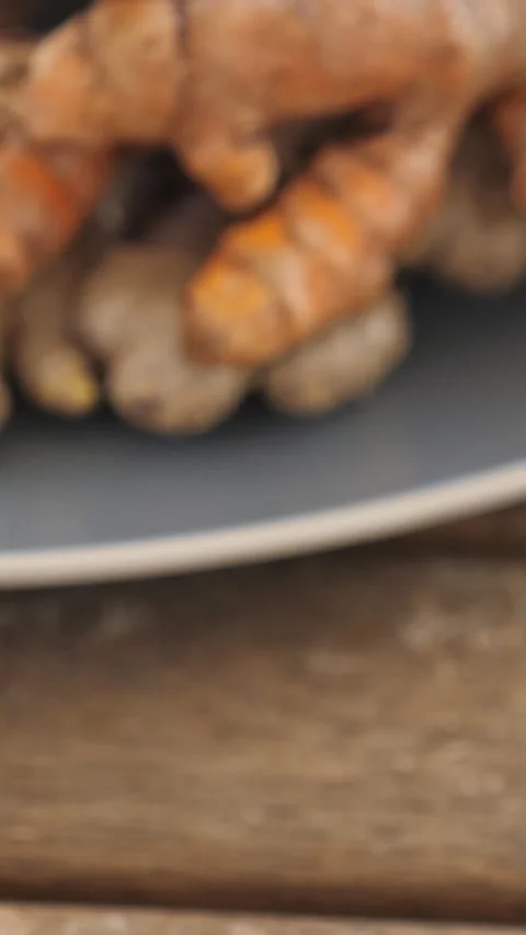 Roots of ginger, alternative medicine concept. Vertical Stock Footage 327184095