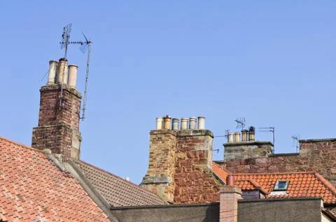 Rooves and chimneys Stock Photos