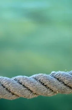 Rope against ocean Stock-Fotos
