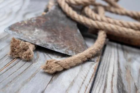 Rope and ax. Stock Photos