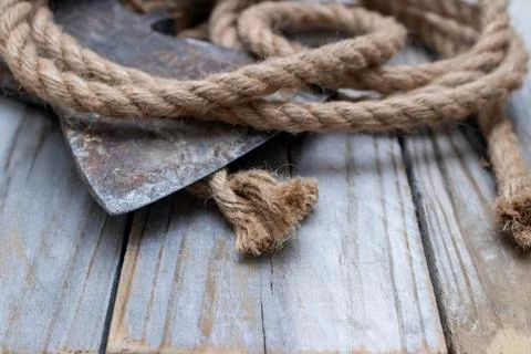 Rope and ax. Stock Photos