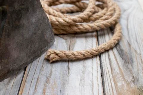 Rope and ax. Stock Photos