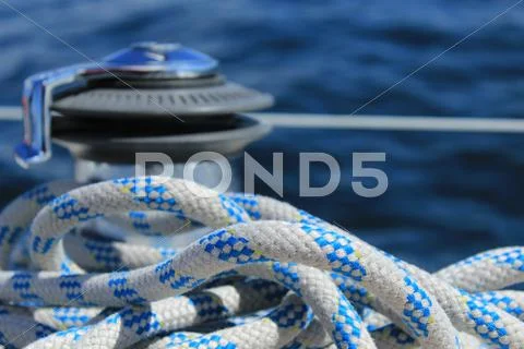 Rope with blurred winch in the background Stock Photos