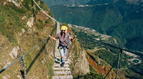 Rope bridge in mountains Stock Photos