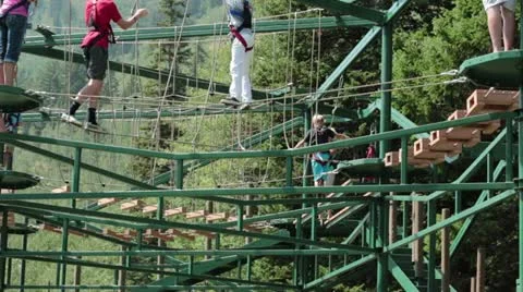 Rope challenge balance course mountain resort HD 2740 Stock Footage 11739273