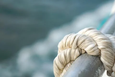Rope Coiled on Rusty Railing Stock Photos