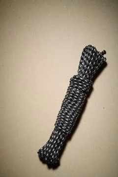 Rope coiled on a table Stock Photos