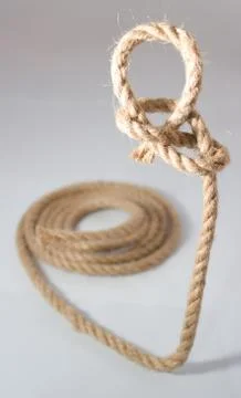 The rope with dragon loop on a white background Stock Photos