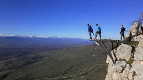 Rope jumping, a man jumps from a cliff, free fall, a man falls from a height Stock Footage 170904251