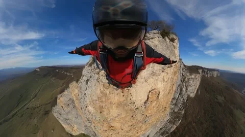 Rope jumping, a man jumps from a cliff, free fall, a man falls from a height Stock Footage 172001507