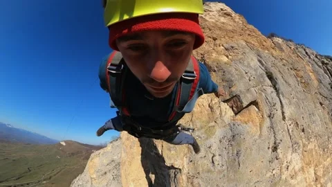Rope jumping, a man jumps from a cliff, free fall Stock Footage 172001601