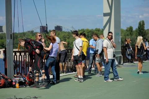 Rope jumping. Worker attaching rigging to the young boy before jumping Stock Photos