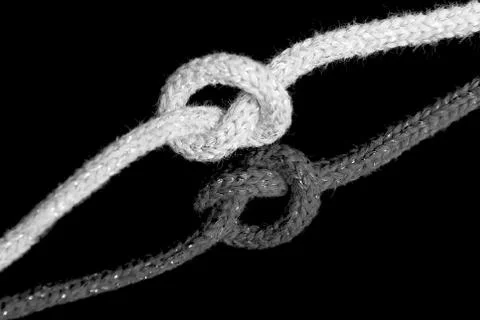 Rope knot and its reflection Stock Photos