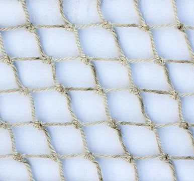 Rope mesh on a white substrate background template Stock Photos