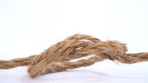 Rope - Pull the knot isolated on white background Stock Footage 126596969