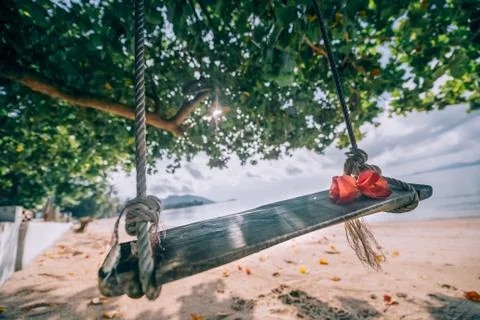 Rope swing on the beach Stock Photos