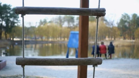 Rope swing in the park. Slow motion 240fps Stock Footage 105840552