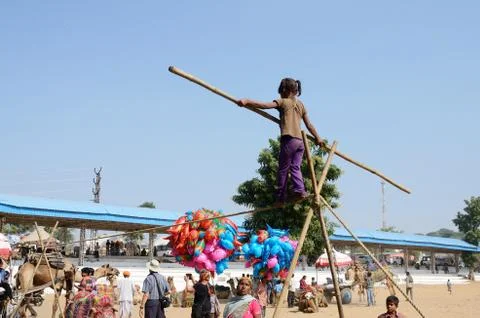 Rope-walker are preparing to circus perfomance in nomadic camp ,India Stock Photos