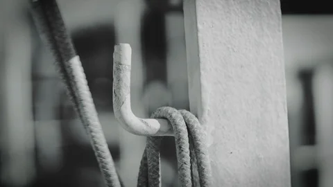 Rope waving in the wind on cargo ship deck, black and white Stock Footage 114508714