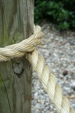 Rope wrapped around a pole Stock Photos