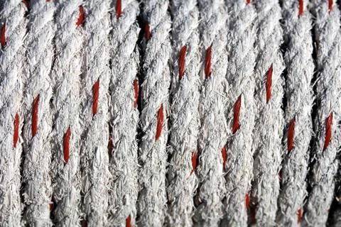 Roped wrapped around piling Stock Photos