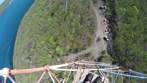 Ropejumping from antenna Stock Footage 132019759