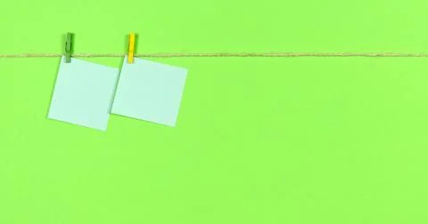 Ropes with clothespins appear notes for notes. Stock Photos