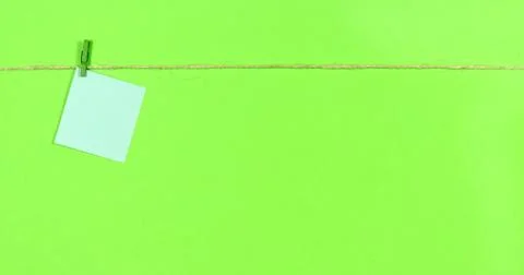 Ropes with clothespins appear notes for notes. Stock Photos