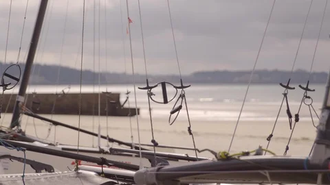 Ropes of a mast on a beach Stock Footage 121707179