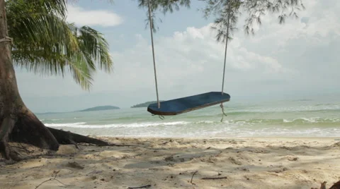 Ropes Swing Rocks And Waves Break Stock Footage 43097995