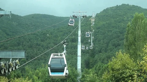 Ropeway Cabins on the mountain Stock Footage 94264912