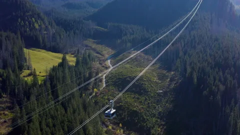 Ropeway, cable car cabins. Ski lifts. Aerial Lift Pylon and Cable Car. Stock Footage 219490083