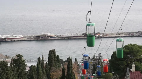 Ropeway with colorful trailers 動画素材 58880104