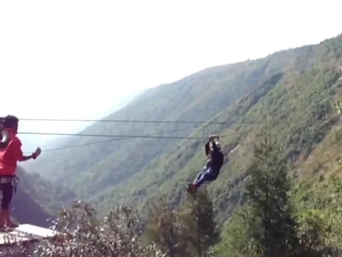 The ropeway is in the middle of two hills Stock Footage 172898849