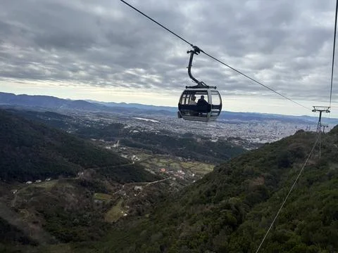 Ropeway, mountains valley cloudy sky winter, view of Tirana city, Albania Stock Photos