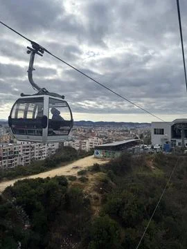 Ropeway, mountains valley cloudy sky winter, view of Tirana city, Albania Stock Photos