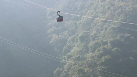 Ropeway over forested hills Stock Footage 170829033