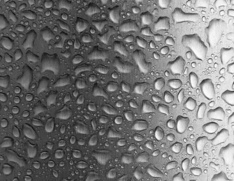 Roplets on the metallic surface Stock Photos