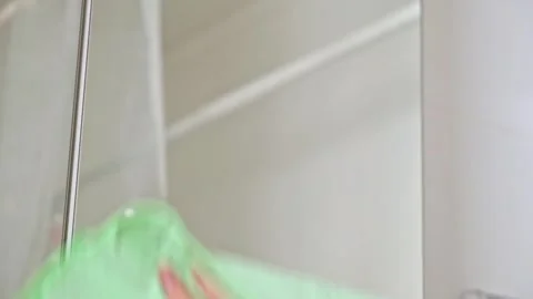 Ropped view man wiping mirror with rag, standing bathroom. Householder make Stock Footage 246070466