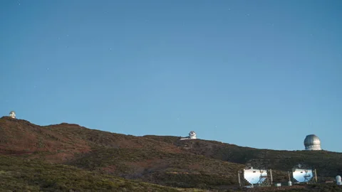Roque de los Muchachos Observatory, advanced telescopes on volcanic landscape Stock Footage 311807683