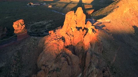 Roques de García volcanic rock formations glowing in warm sunlight at Teide Stock Footage 345534157