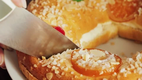Roscon de reyes. A round cake baked from a rich yeast dough and decorated with Stock Footage 335140746