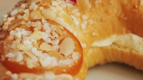 Roscon de reyes. A round pie baked from rich yeast dough and decorated with Stock Footage 335140454