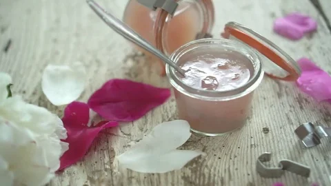 Rose blossom jam in the middle of petals Stock Footage 72317801